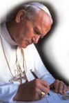 Juan Pablo II escribiendo